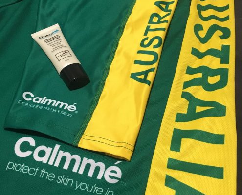 The yellow and green, Skate Australia pants with the Calmme protect the skin you're in logo.